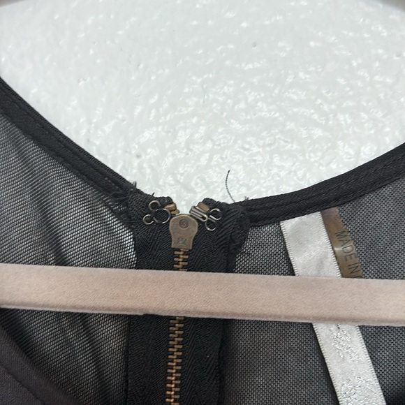 Short stretch dress with metallic stones on a black base, curvy cut, size S - Picture 4 of 10